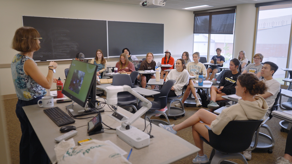 Ellen teaching a classroom
